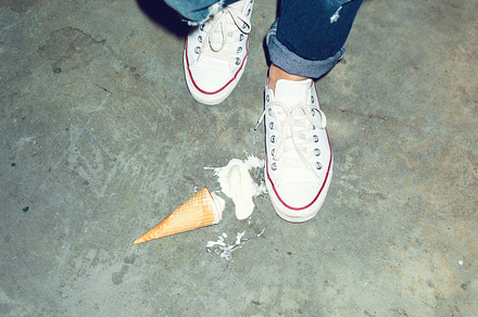 Dropped ice cream featuring ice, cream, and cone