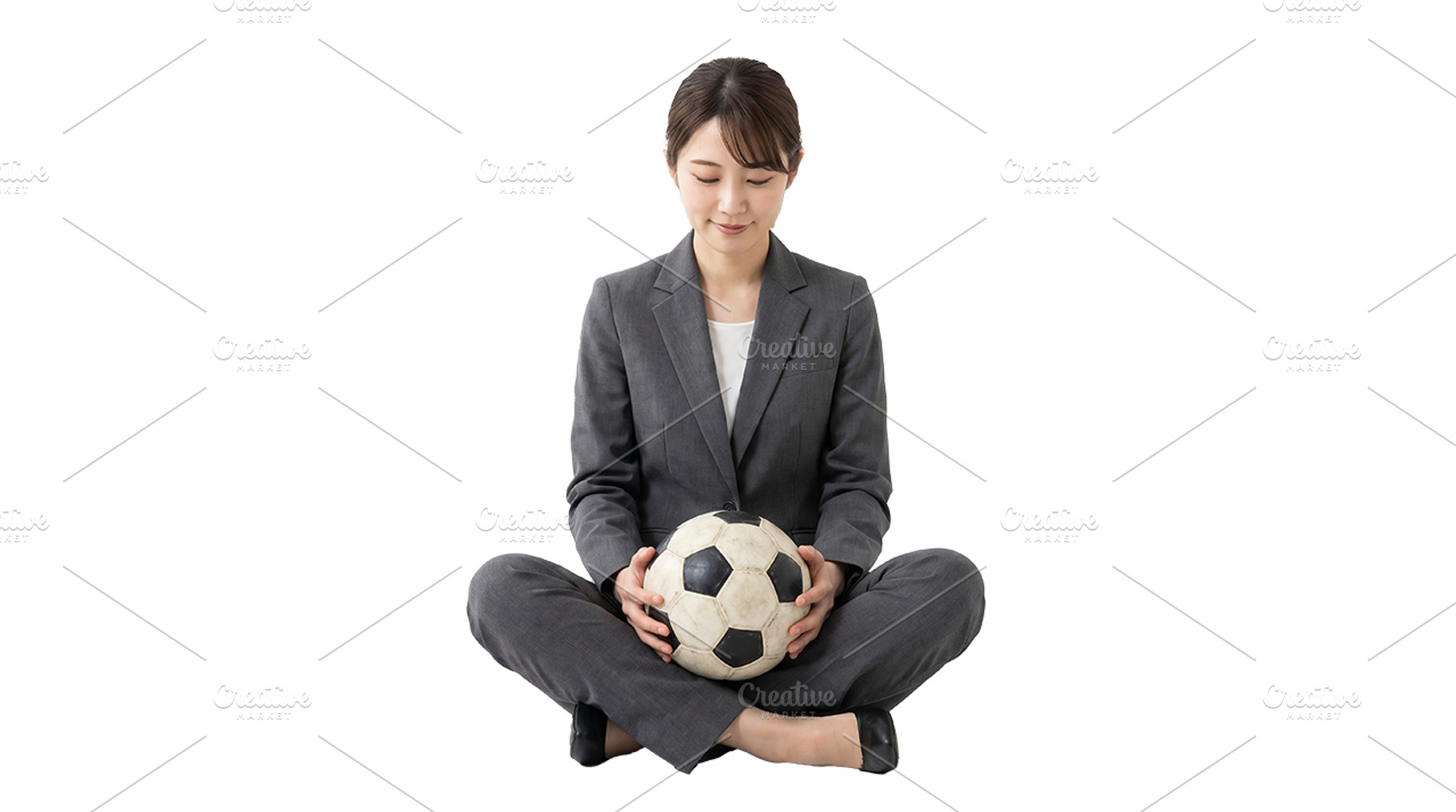 businesswoman holding a soccer ball, a Person Photo by itakdalee