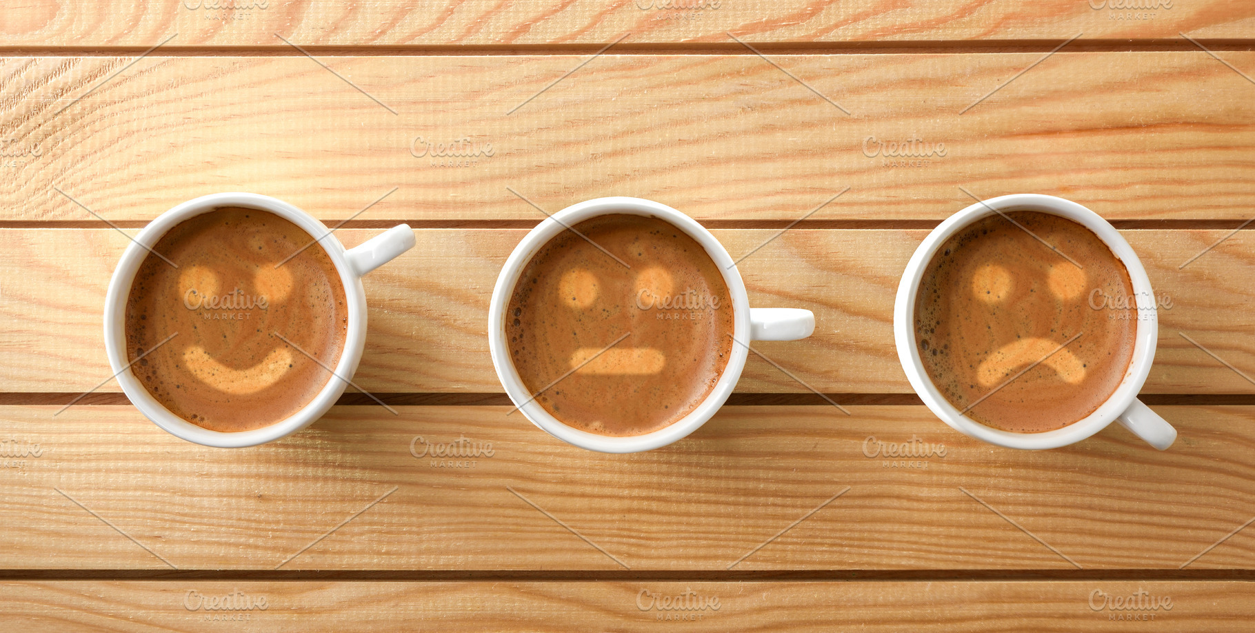 Collection of four coffee cups with various designs in foam, a Food & Drink Photo by Davizro's Market