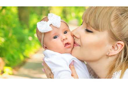 Mom with a baby in nature. Selective, a Person Photo by yanadjana