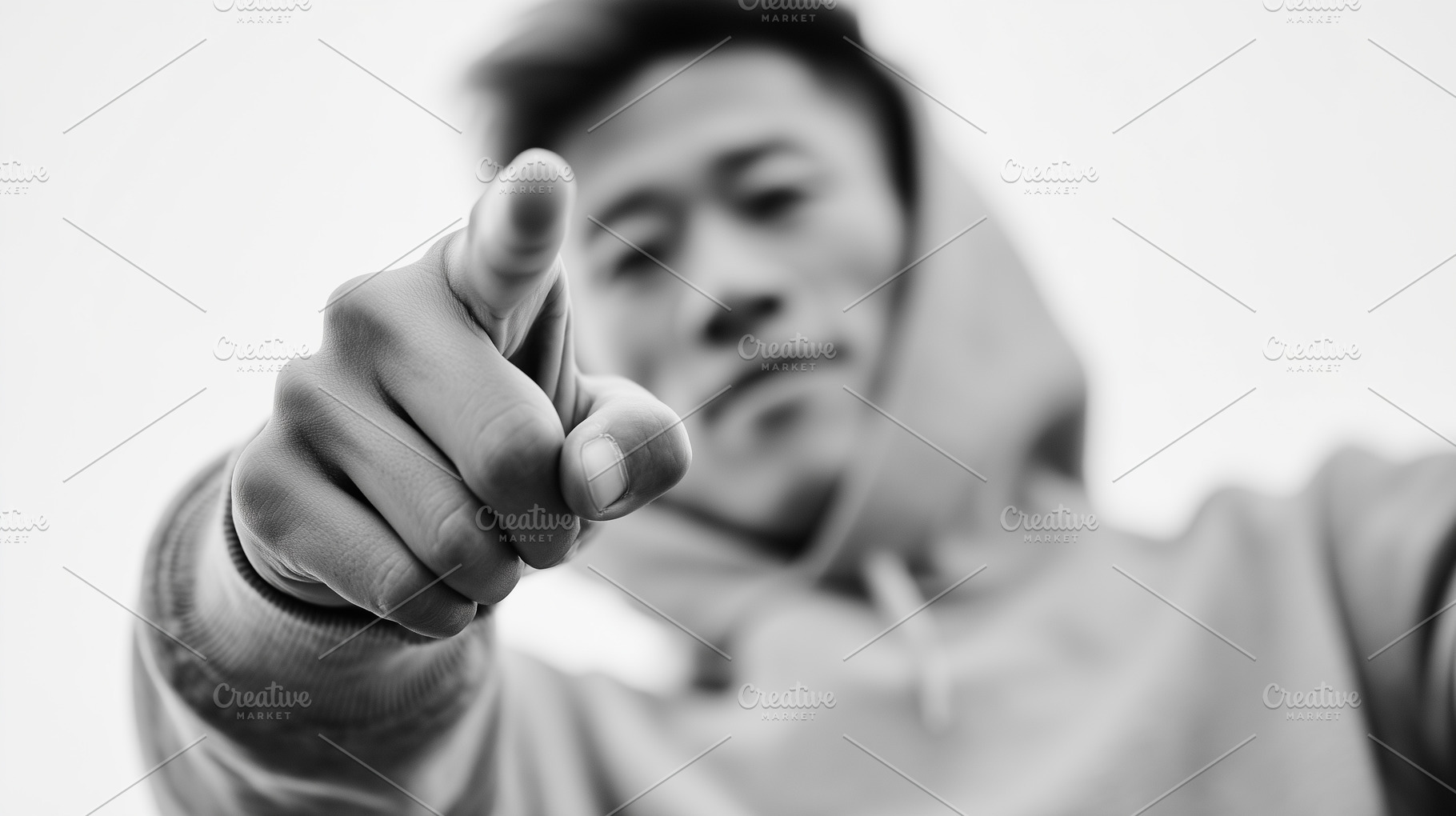 Young asian man in a hoodie points, a Person Photo by MistyDay