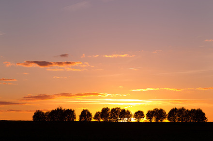 Evening landscape with silhouettes o containing sunset, landscape, and evening, a Nature Photo by oleghz