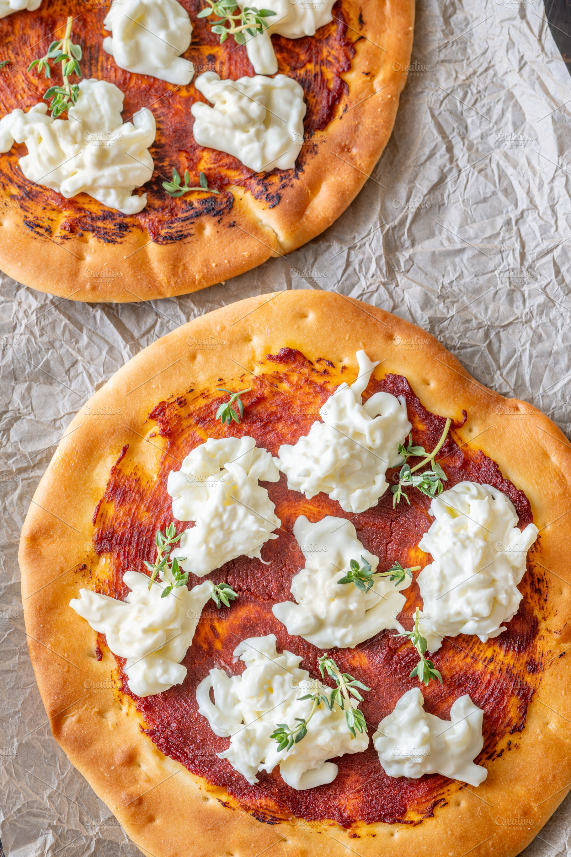 Mini pizzas baked with tomato sauce,, a Food & Drink Photo by Alexander Prokopenko