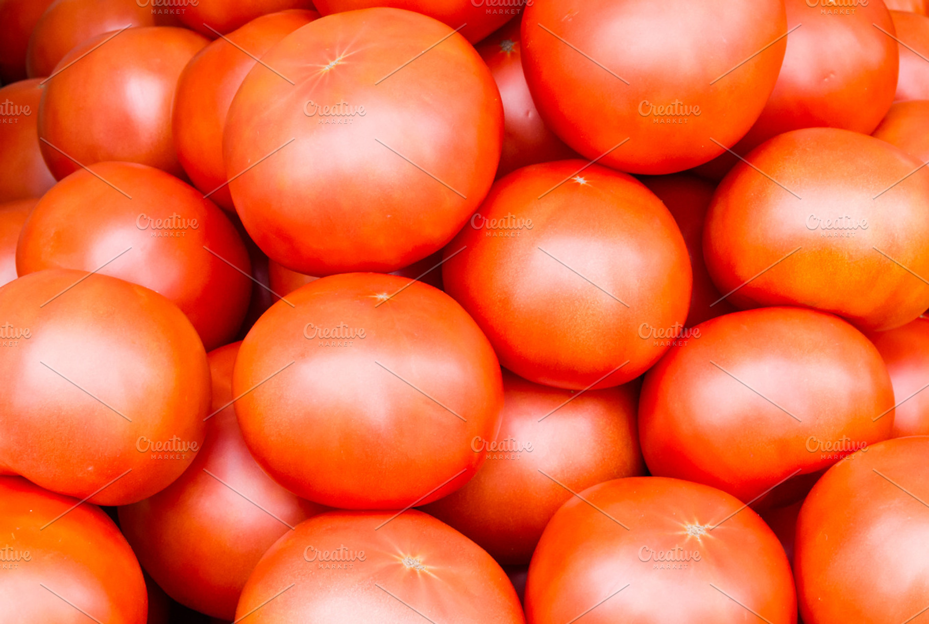 Red ripe tomatoes on display