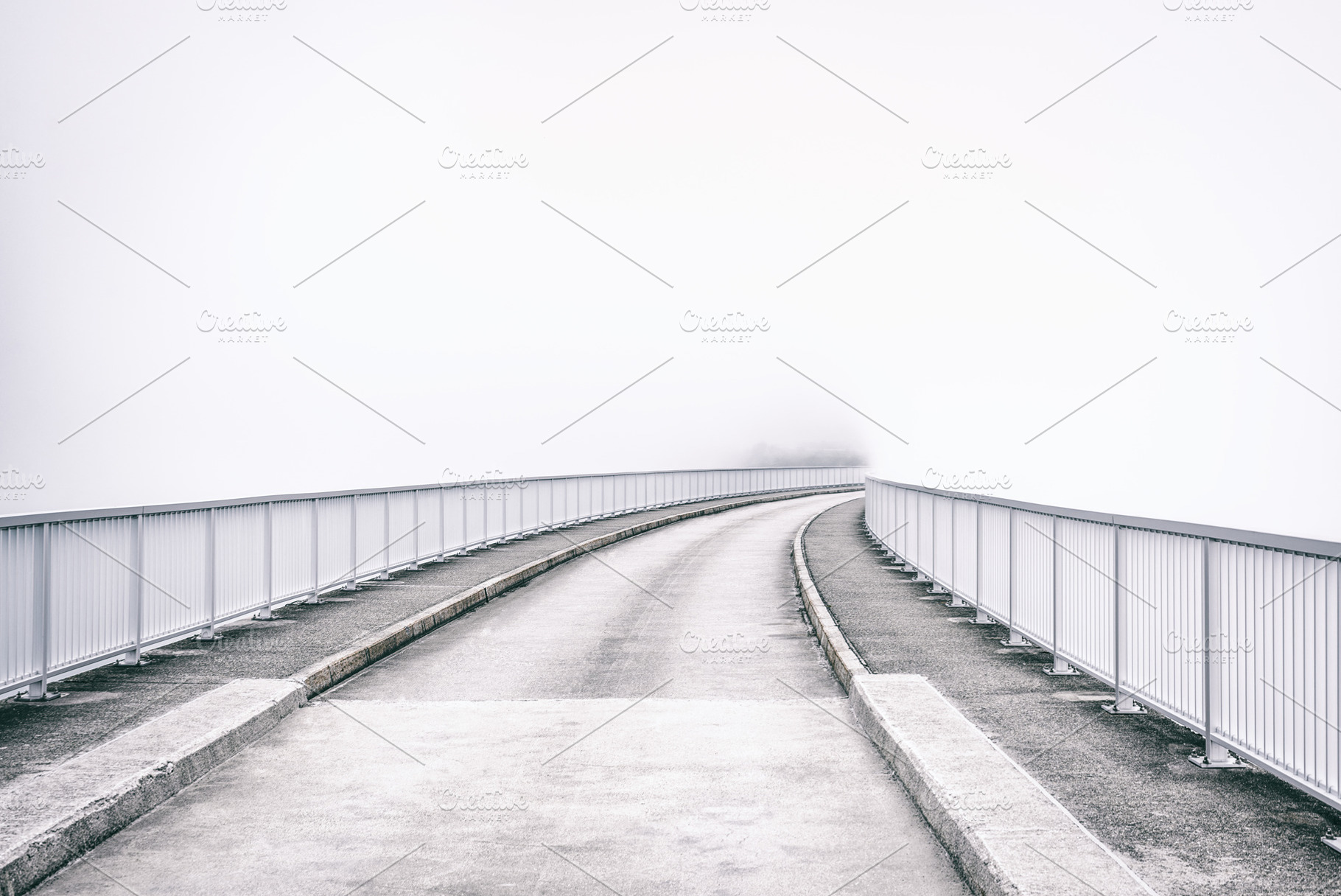 Foggy road through the bridge, an Industrial Photo by Juicy Photography
