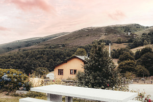 Picnic table in countryside sunset, an Architecture Photo by SkyNext