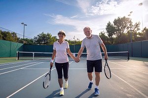 Senior Couple Walking Together on Tennis Court, a Sports & Recreation Photo by Davizro's Market