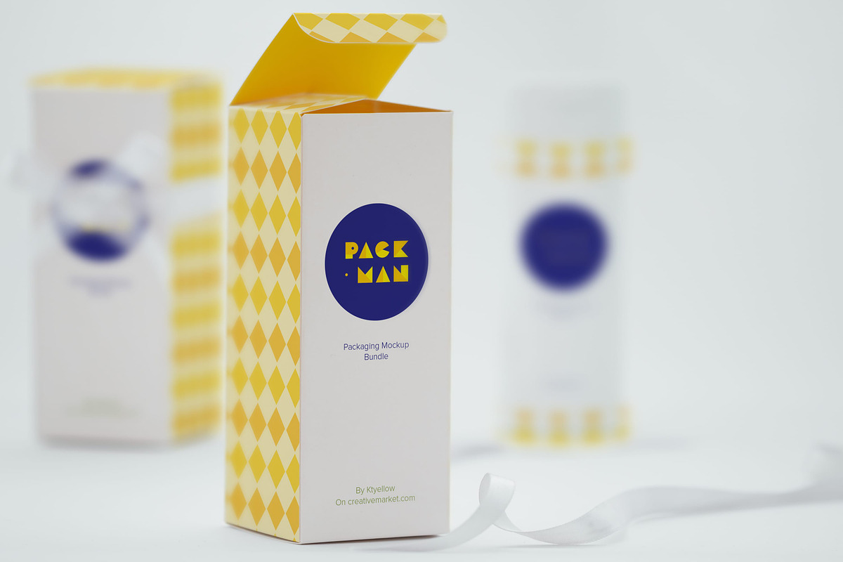 Tall Gift Box Mockup 03, a Packaging Mockup by Ktyellow (Photo 1 of 2)