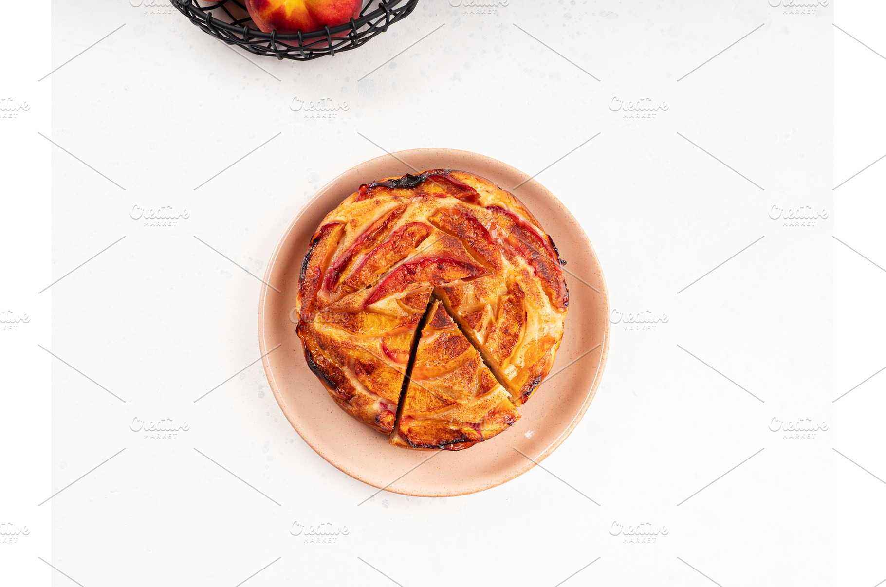 Vegan nectarine peach cake on white, a Food & Drink Photo by Lifemorning