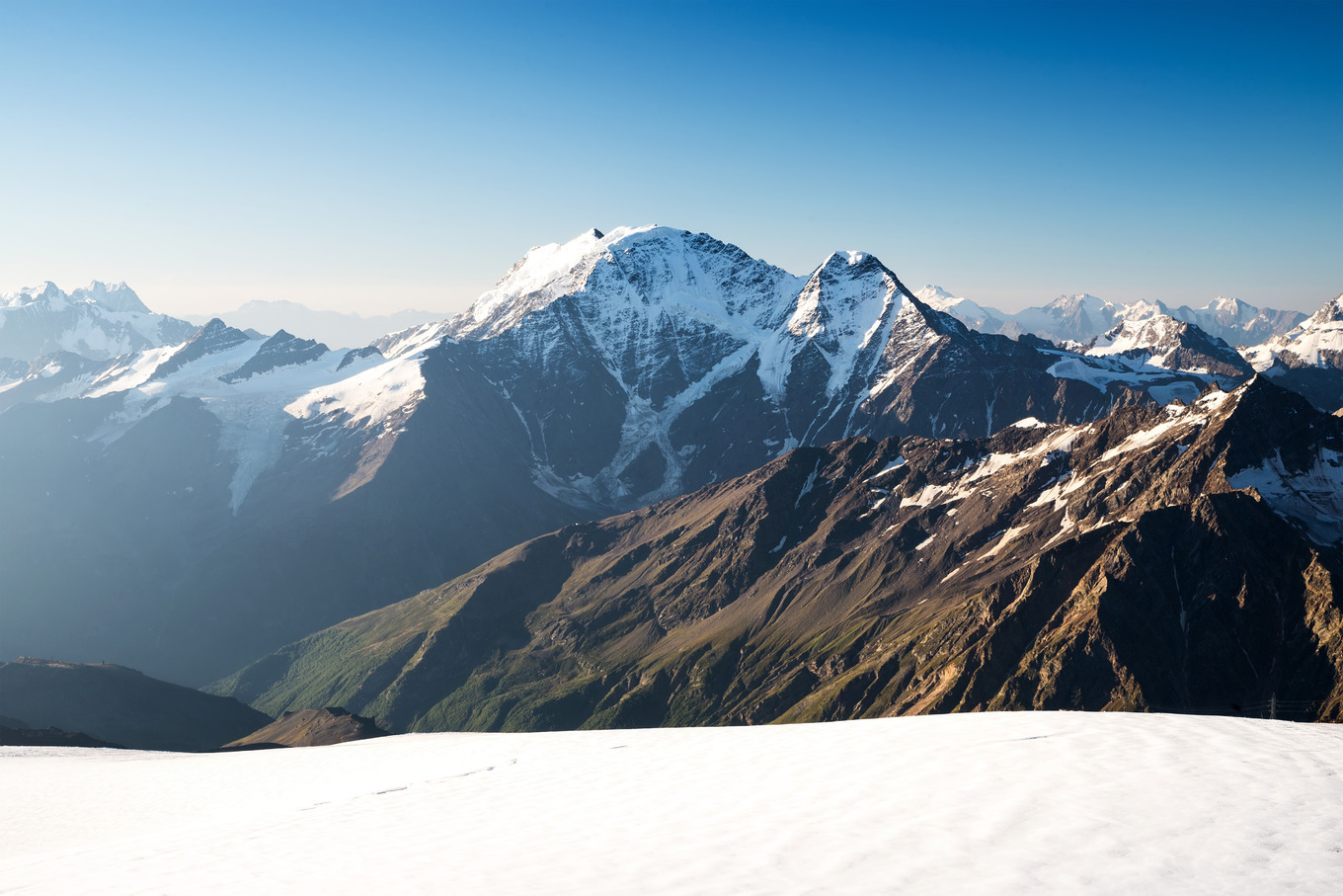 High mountain ridge featuring mountain, snow, and top, a Nature Photo ...