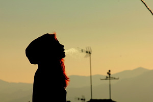Girl smoking stock photo containing voltage and god