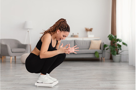 Unhappy Fitness Lady Standing On, a Person Photo by Prostock-Studio