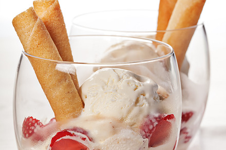 Vanilla ice cream with strawberries in glass containing closeup, cold, and, a Food & Drink Photo by Olha Klein