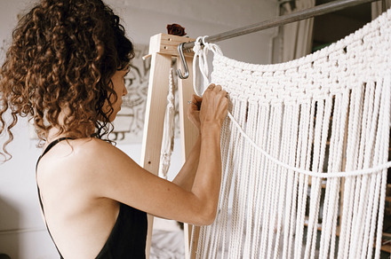 Woman creates macrame stock photo containing art and hand