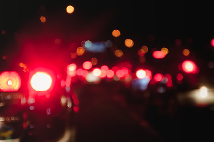 Car taillights in blur on the evening road at rush hour, a Transportation Photo by TanaCh