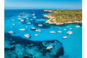 Aerial view of luxury yachts and, a Transportation Photo by den-belitsky