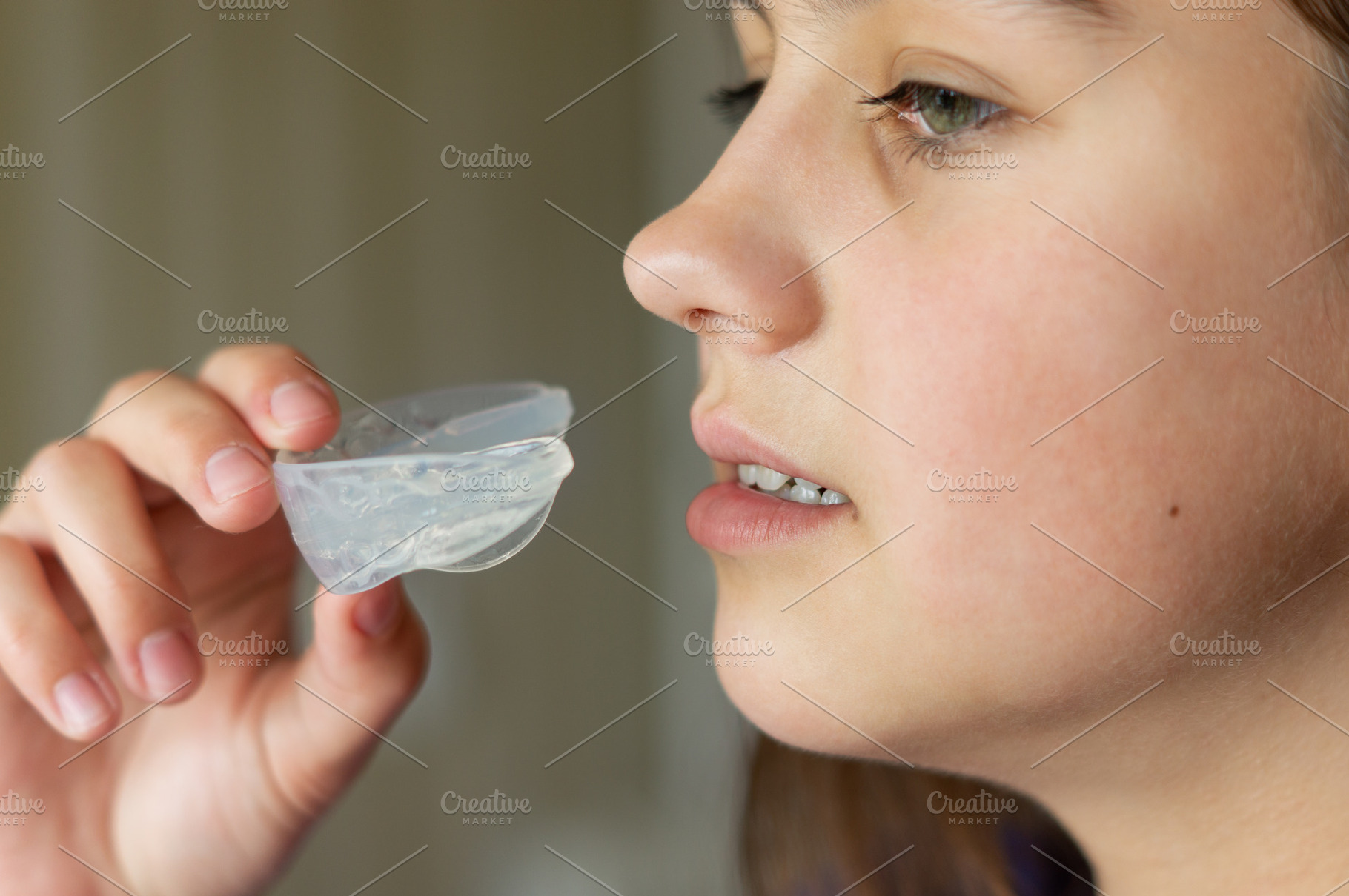 The girl takes out the mouth guard, a Person Photo by Nastya_Velko