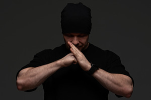 Man in black beanie and sweatshirt, a Person Photo by Elena Vagengeim