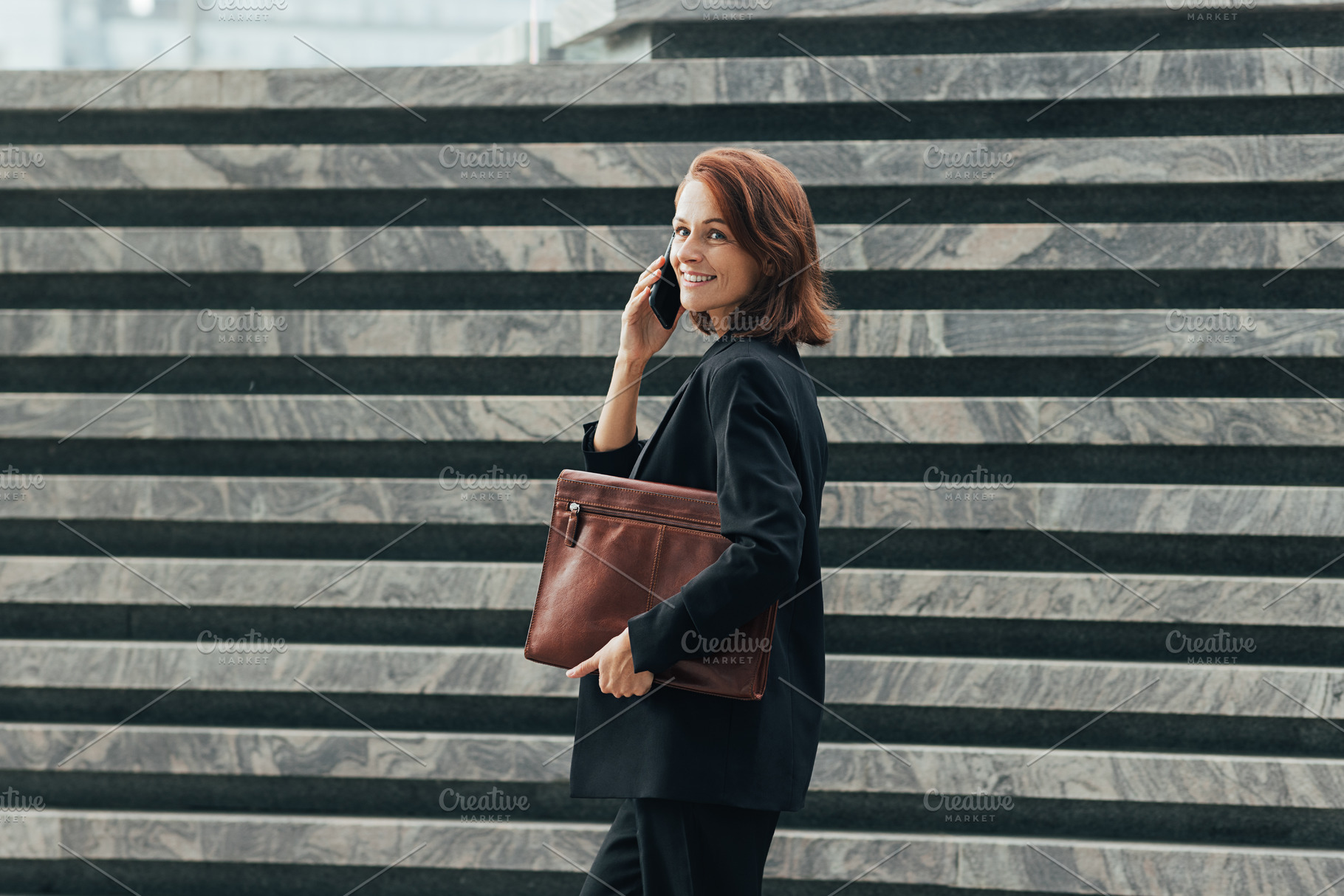 Happy middle-aged businesswoman, a Business Photo by Artem Varnitsin