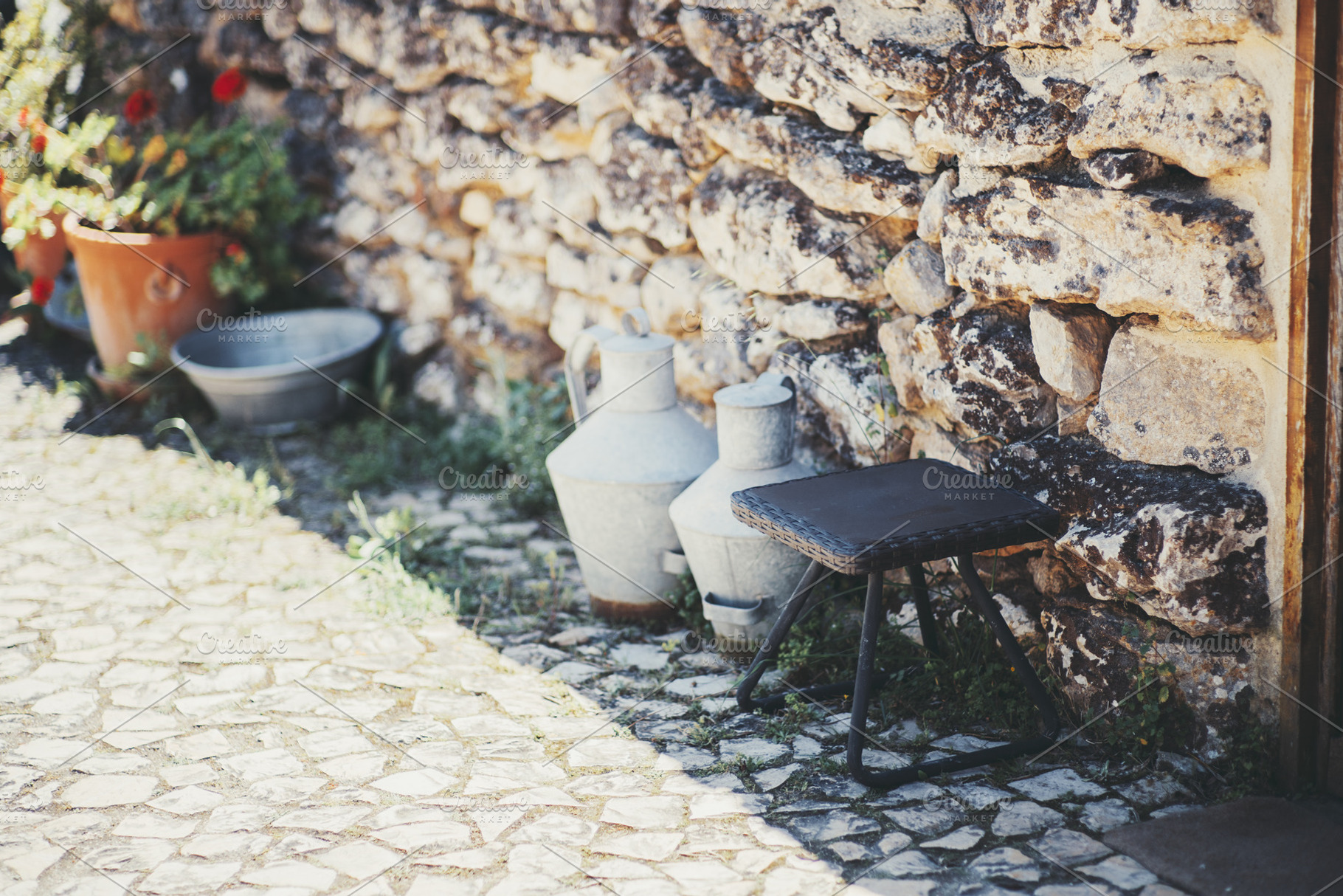 Rustic courtyard with milk cans, an Arts & Entertainment Photo by SkyNext