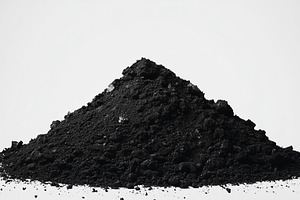 Mound of fine black soil or charcoal, a Nature Photo by MistyDay
