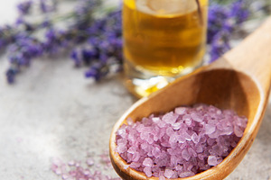 Relaxing spa setting with lavender essential oil and bath salt, a Health & Medical Photo by Olena Rudo