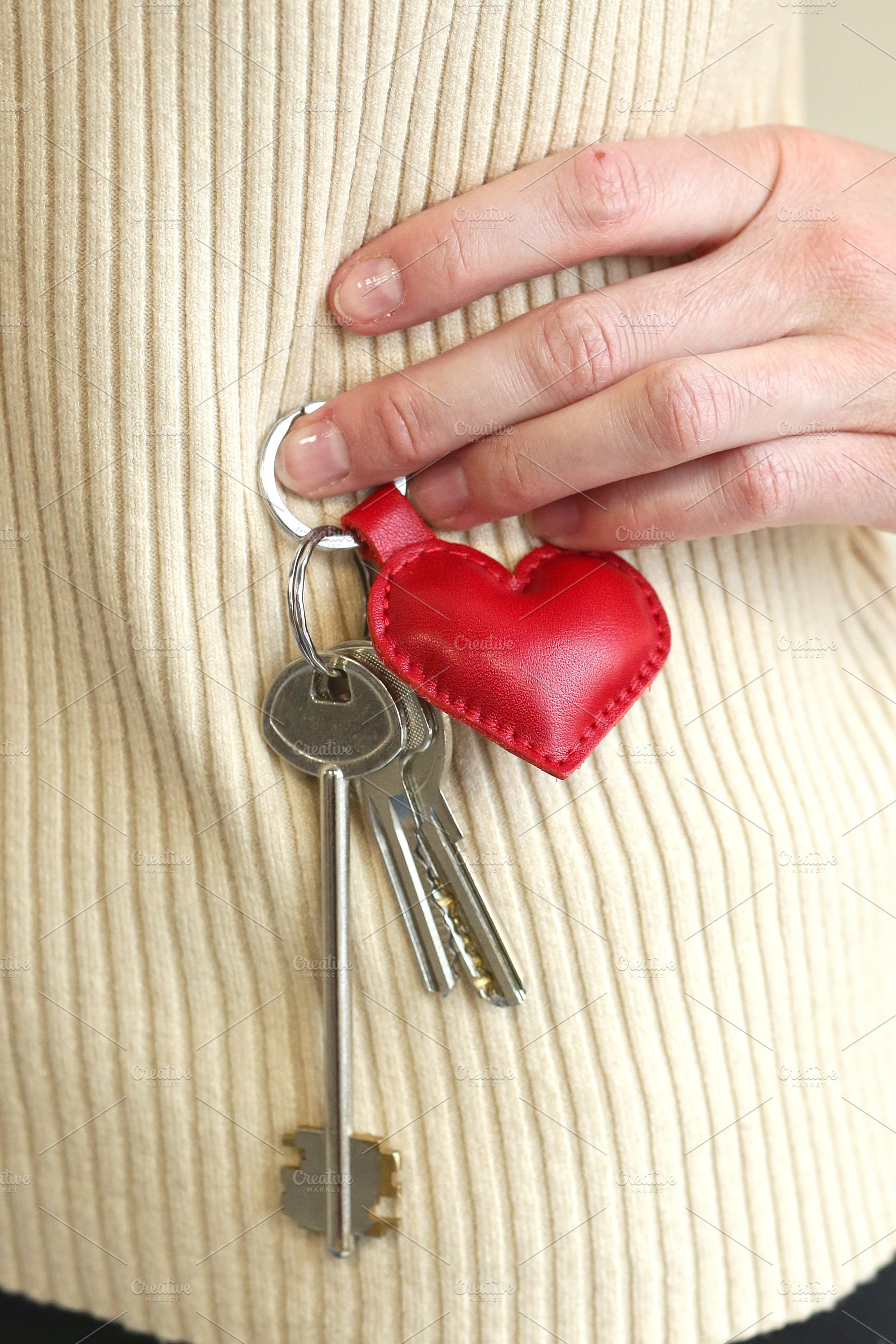 leather red heart key trinket as a v, a Photo by Famapictura