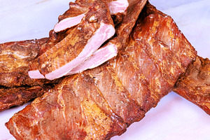 Smoked pork ribs meat placed on