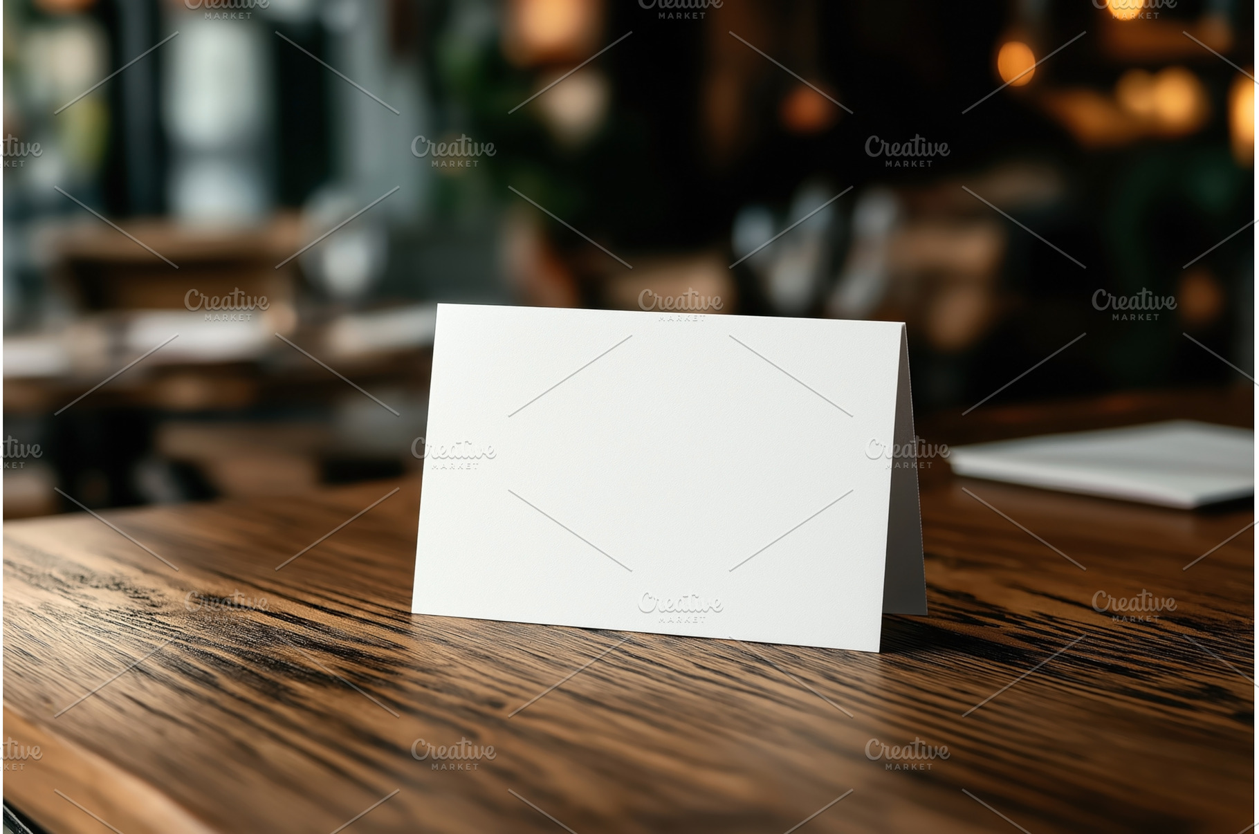 Blank white table tent card mockup, a Business Photo by Sergey Kotenev