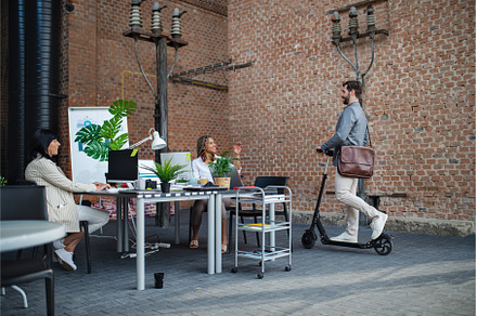 Young and old businesspeople working, a Person Photo by HalfPoint
