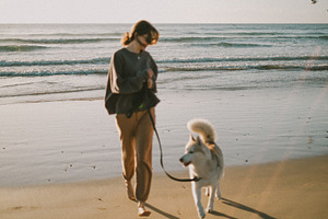 Woman running with a dog