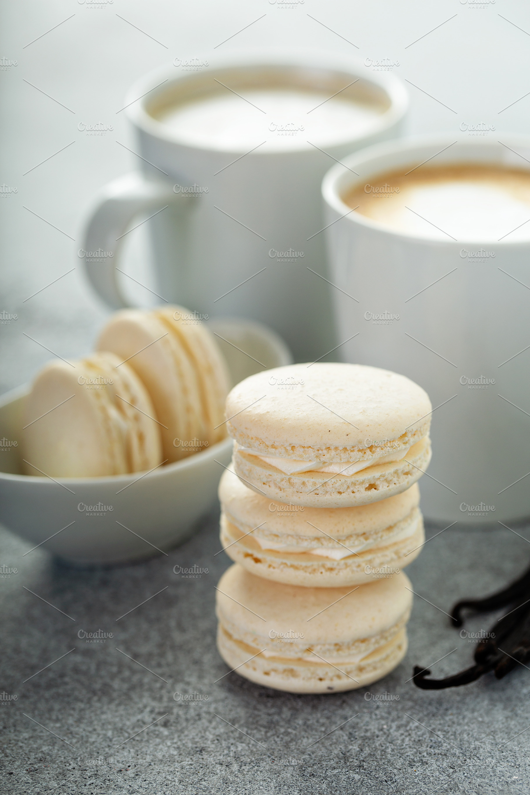 Vanilla macarons stacked, a Food & Drink Photo by farwasser