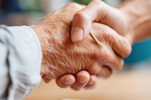 Handshake symbolizing partnership and agreement, a Business Photo by AlyaAnd