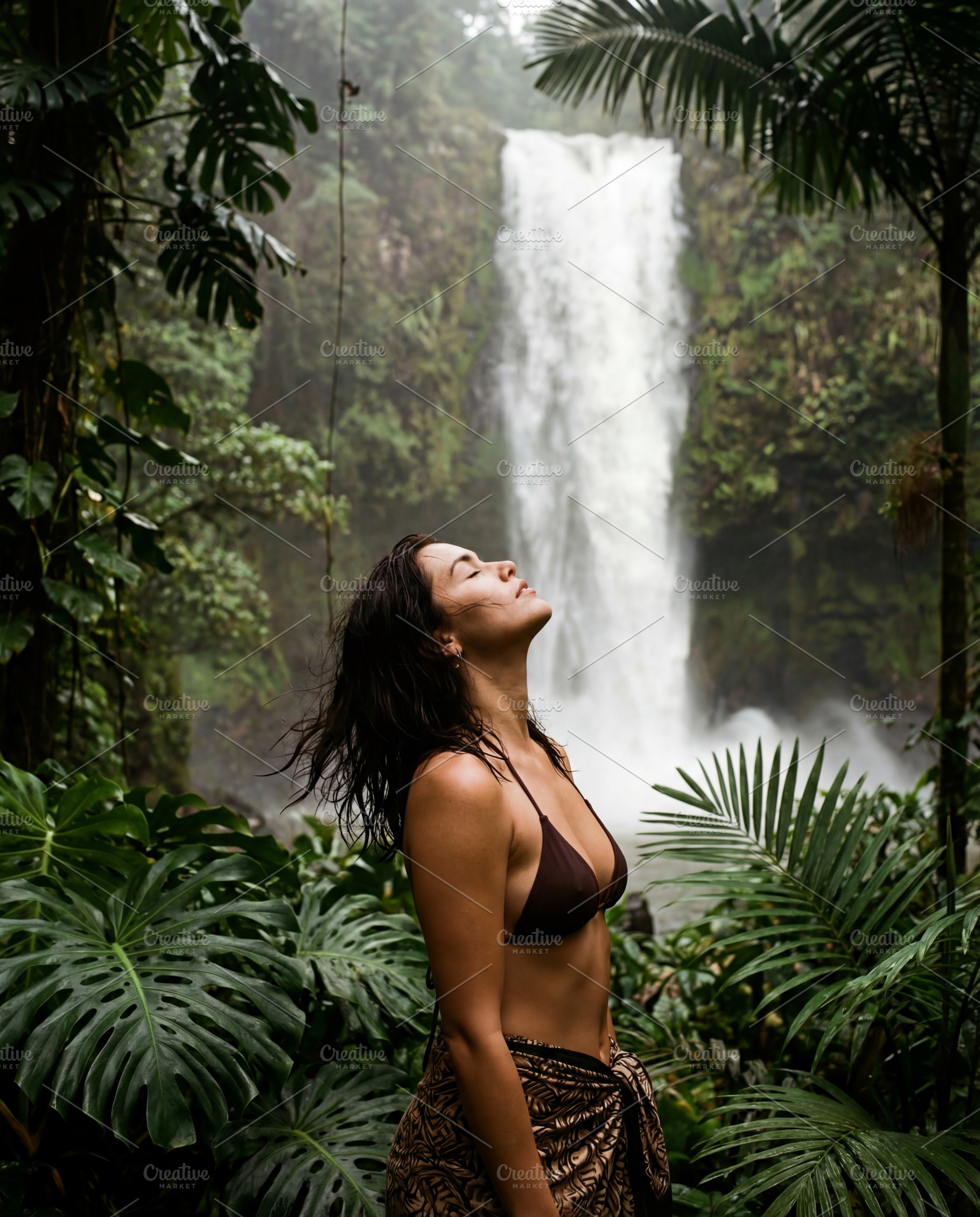 Serene woman enjoying nature, a Holiday Photo by Virgo Studio