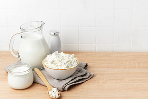 Fresh cottage cheese, milk, and yogurt creating a healthy breakf, a Food & Drink Photo by Olena Rudo