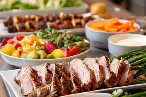 Buffet table with sliced roast beef and fresh fruit, a Food & Drink Photo by AlyaAnd
