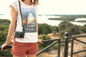 woman adventure at sea, with camera