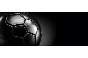 Black soccer ball under dramatic, a Sports & Recreation Photo by Igor Tichonow