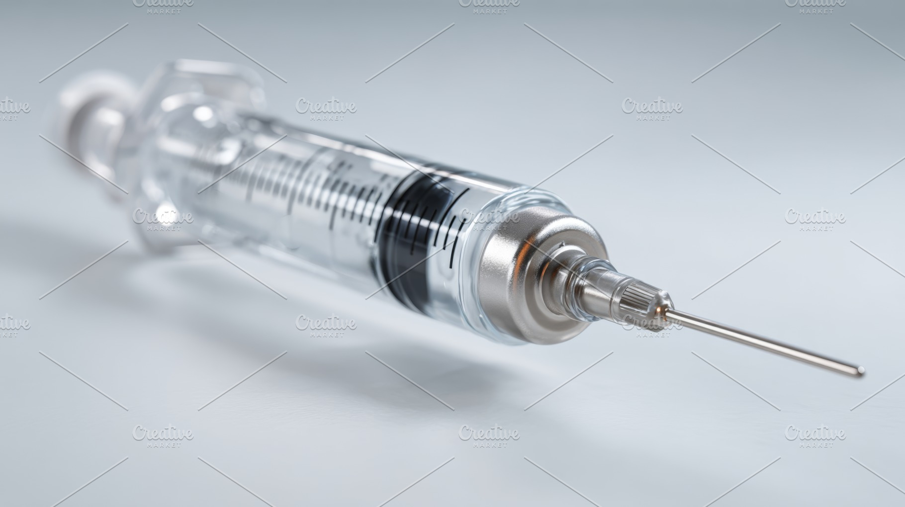 Close-up of a clear syringe with a stainless steel needle on a soft-focus backg, a Business Photo by ImageMir