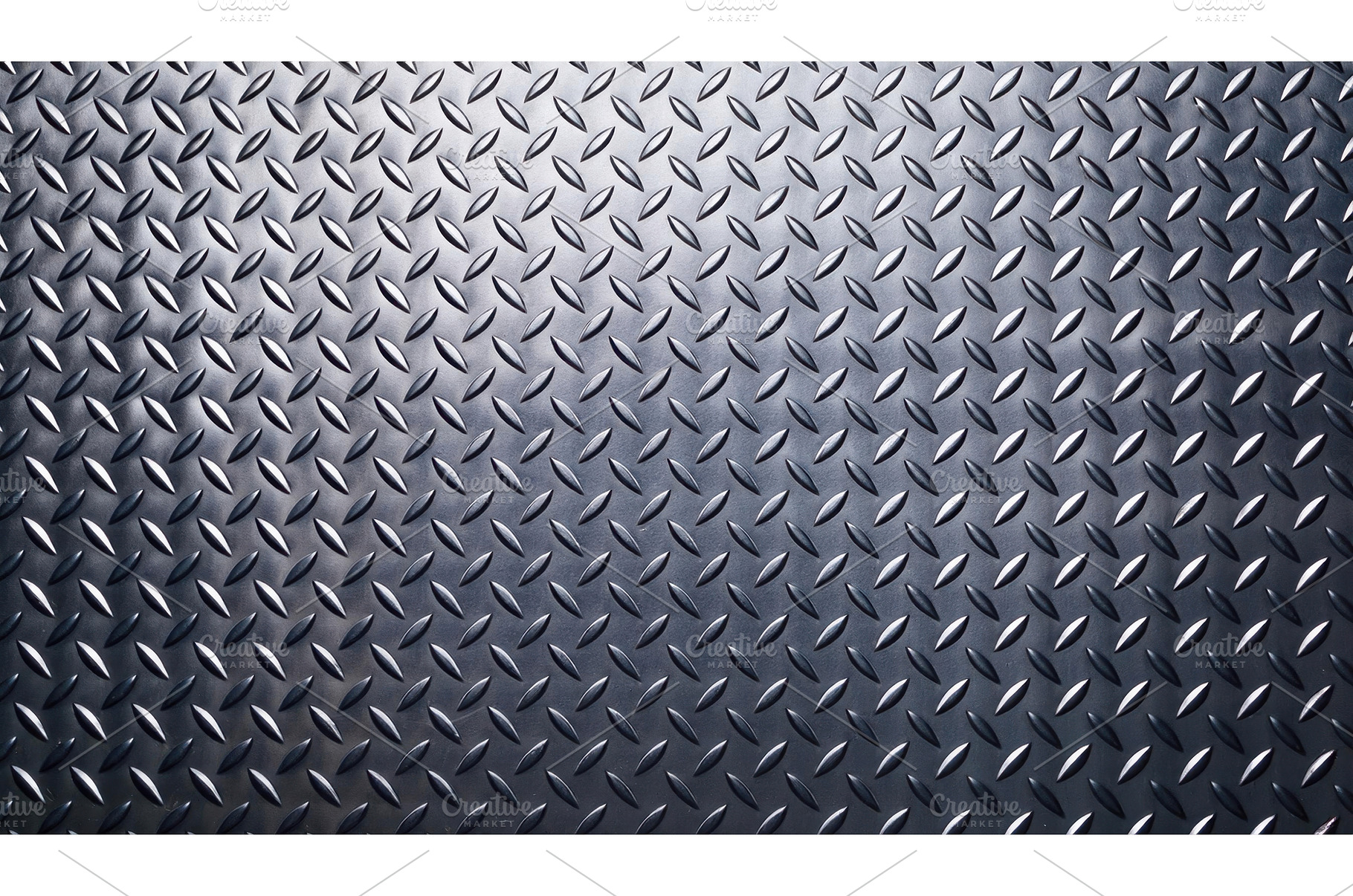 Diamond plate steel pattern close-up, an Industrial Photo by Igor Tichonow