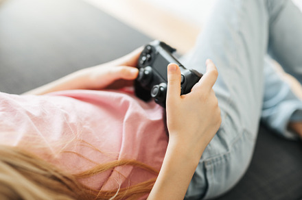 Girl playing video game at home, a Sports & Recreation Photo by Olena Rudo