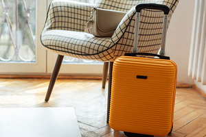 Yellow suitcase and handbag preparing for travel journey, a Holiday Photo by Olena Rudo