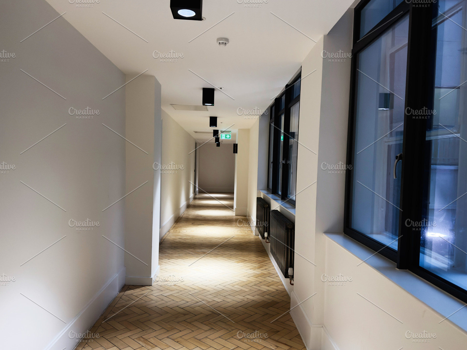 Bright modern hallway with large windows and tiled floor in a quiet office buil, a Photo by AS photostudio