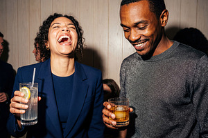 Joyful Colleagues Enjoying Cocktails, a Person Photo by Virgo Studio