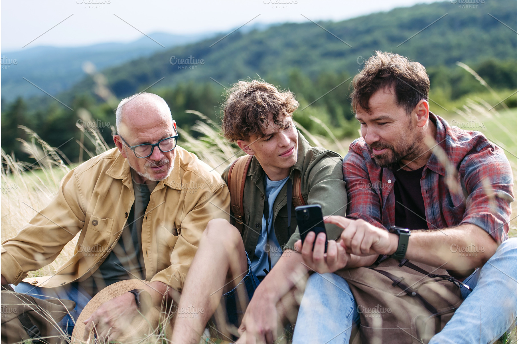 Grandfather, father and teen boy, a Person Photo by HalfPoint