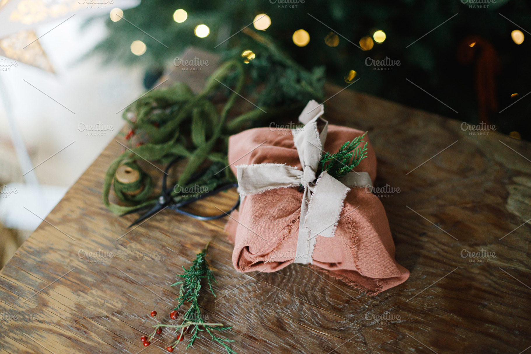 Merry Christmas! Stylish christmas present wrapped in fabric wit, a Holiday Photo by Sonjachni