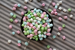 Fruity Colored Rainbow Marshmallows in a Bowl, top view., a Food & Drink Photo by LiudmylaChuhunova