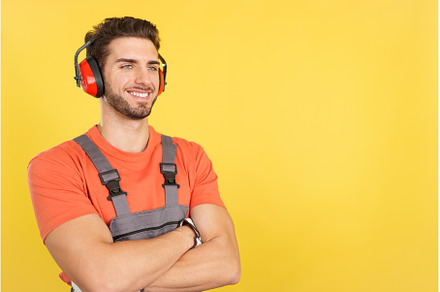 Distracted carpenter looking away, a Person Photo by Iván Moreno STOCK PHOTO