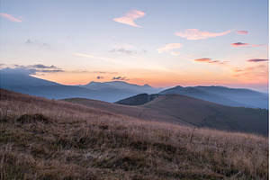 Majestic mountain sunrise with pink, a Nature Photo by Stockphoto by vzwer