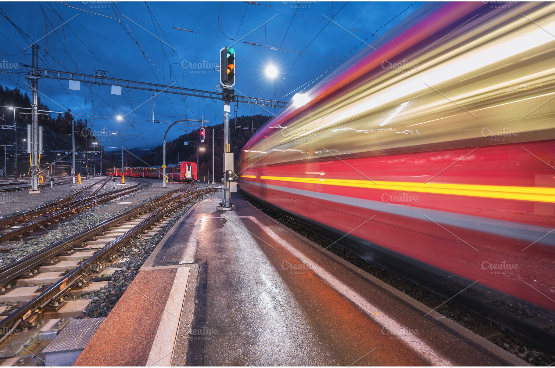 Blurred red passenger train passing, a Transportation Photo by den-belitsky
